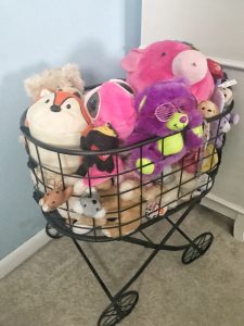 Use a laundry cart to corral stuffed animals and toys