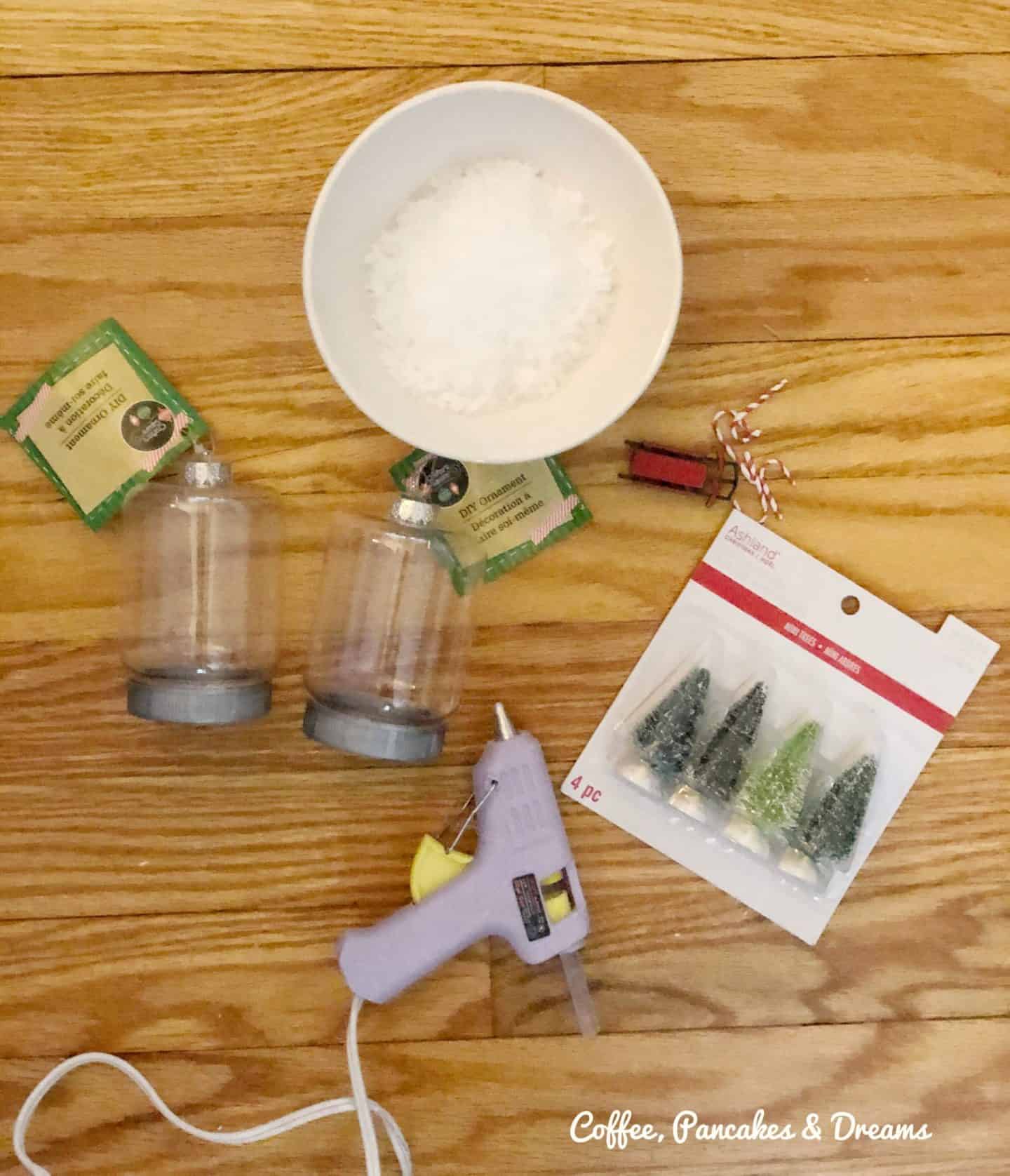 Supplies to make mini snow globes