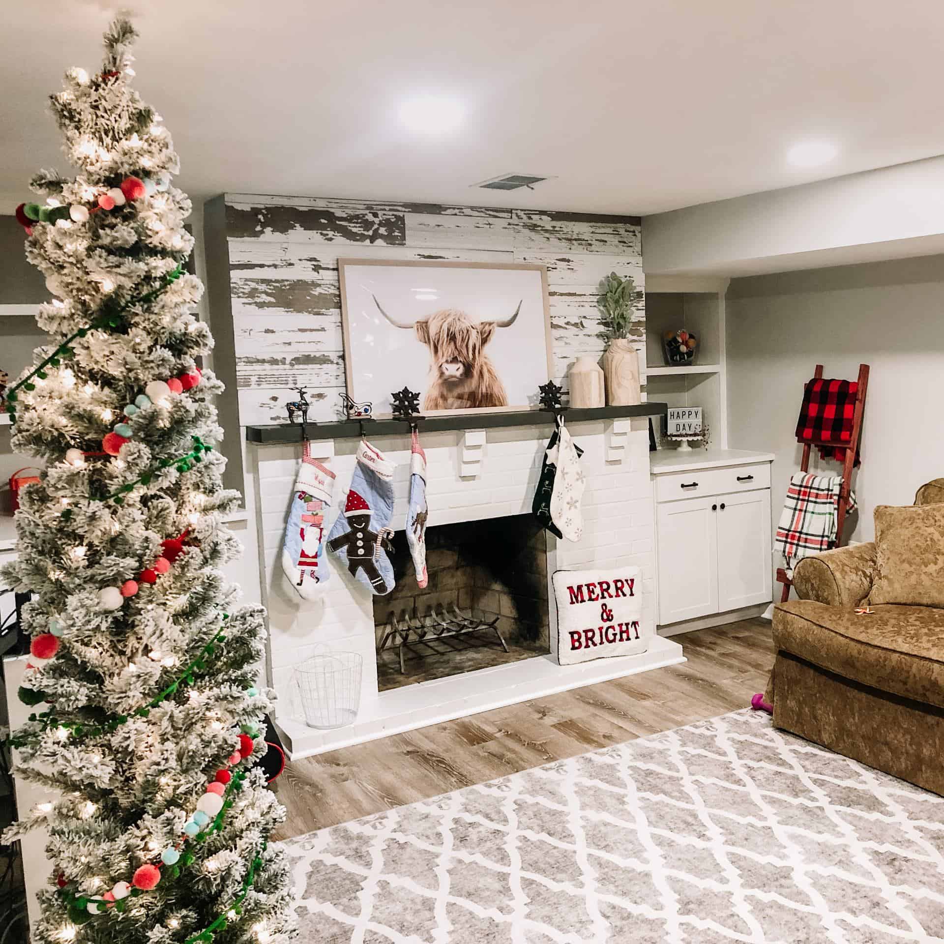 Farmhouse Christmas Playroom Decor #rustic #flockedtree #stockings